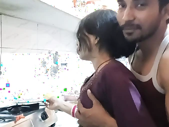 Hot Indian teen with large melons gets frolic in the kitchen with her beau