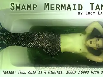 Lucy LaRue plays eradicate affect problem of a Swamp Mermaid Tank almost a super-hot unique cut capers
